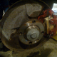 Plywood to simulate pads and rotor to keep the piston from popping out during bleeding